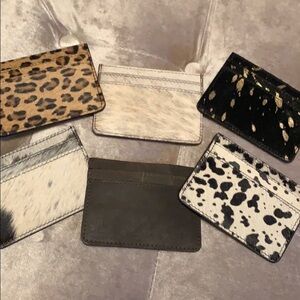 Myra Hairon credit card holders, both sides hairon